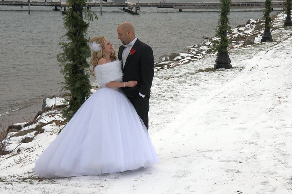 Old Rittenhouse Inn Bride and Groom at Bay in Winter